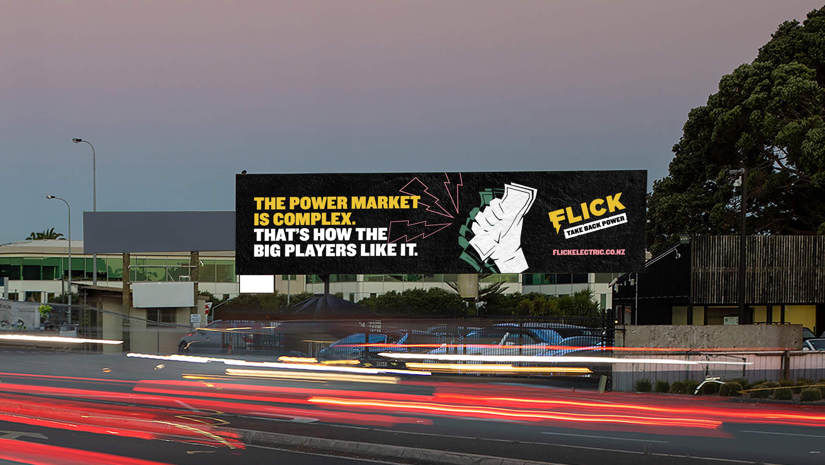 A photograph of our flick energy advertisement displayed on a digital billboard.