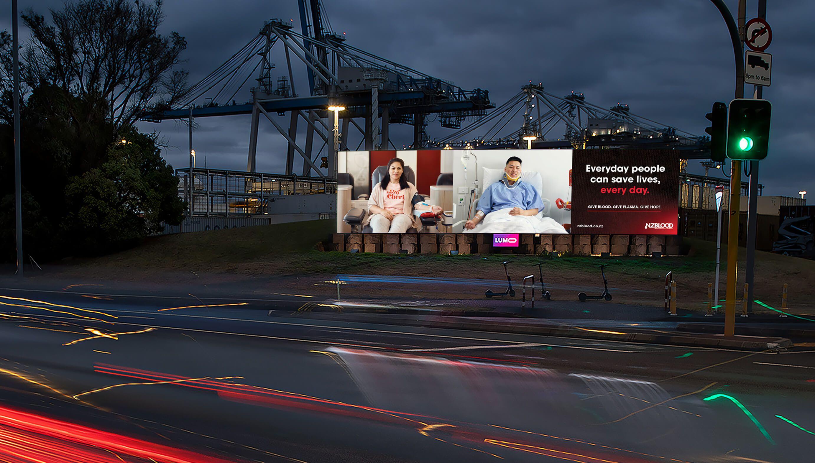 A photo of the print ad we produced for NZblood being delivered on an electronic billboard.