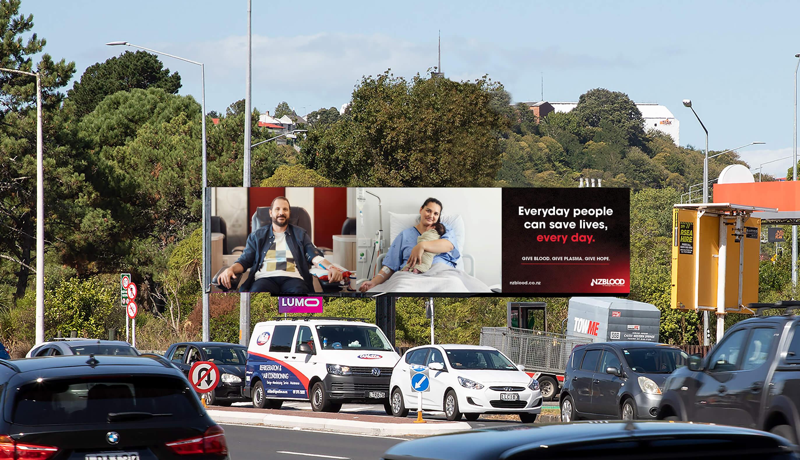 A photograph of an NZblood advertisement shown on a billboard.